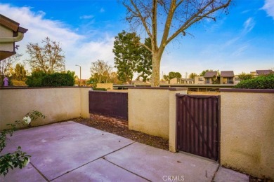 Highly Coveted Two-Story End-Unit Townhome in Valencia Fairways on Vista Valencia Golf Course in California - for sale on GolfHomes.com, golf home, golf lot