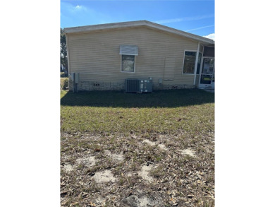 55+ gated golf course community   *PRICE REDUCED* 2 bedroom 2 on Zellwood Station Country Club in Florida - for sale on GolfHomes.com, golf home, golf lot