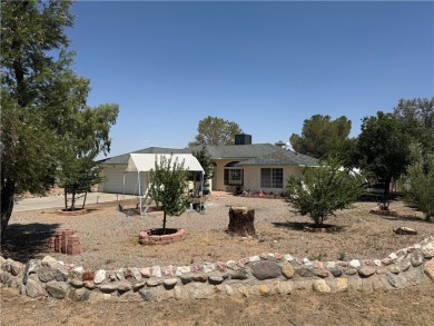 Stunning 3 Bed, 2 Bath Home with Mountain Views located in on Valle Vista Golf Course in Arizona - for sale on GolfHomes.com, golf home, golf lot