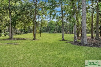 This Southern Charm stunner is located just a few feet outside on Wilmington Island Club in Georgia - for sale on GolfHomes.com, golf home, golf lot