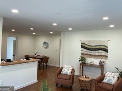 Welcome home! This beautifully remodeled 3-bedroom, 2 bath home on East Lake Golf Club in Georgia - for sale on GolfHomes.com, golf home, golf lot