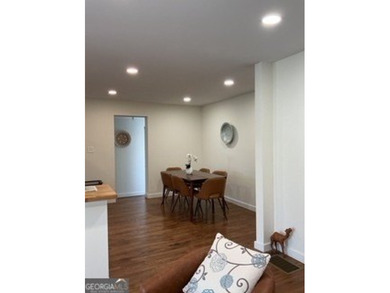 Welcome home! This beautifully remodeled 3-bedroom, 2 bath home on East Lake Golf Club in Georgia - for sale on GolfHomes.com, golf home, golf lot