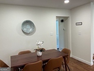 Welcome home! This beautifully remodeled 3-bedroom, 2 bath home on East Lake Golf Club in Georgia - for sale on GolfHomes.com, golf home, golf lot