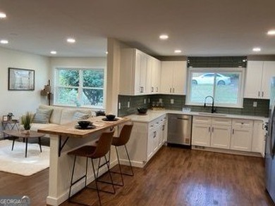 Welcome home! This beautifully remodeled 3-bedroom, 2 bath home on East Lake Golf Club in Georgia - for sale on GolfHomes.com, golf home, golf lot