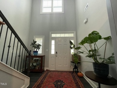 This lovely 5 bedroom, 3 full baths with a first floor primary on Olde Liberty Golf and Country Club in North Carolina - for sale on GolfHomes.com, golf home, golf lot