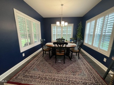 This lovely 5 bedroom, 3 full baths with a first floor primary on Olde Liberty Golf and Country Club in North Carolina - for sale on GolfHomes.com, golf home, golf lot