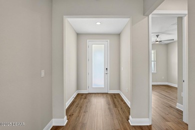 1033 Scramble Drive is a 2023 Meritage Home offering an on LPGA International Golf Course in Florida - for sale on GolfHomes.com, golf home, golf lot