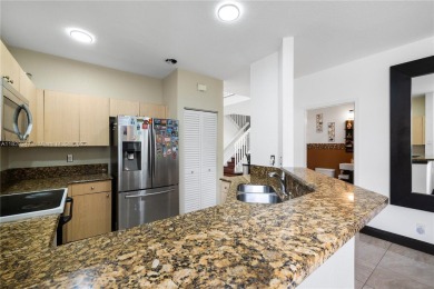 Beautifully maintained 5 bed, 2.5 bath home in the guard-gated on Weston Hills Country Club in Florida - for sale on GolfHomes.com, golf home, golf lot
