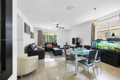 Beautifully maintained 5 bed, 2.5 bath home in the guard-gated on Weston Hills Country Club in Florida - for sale on GolfHomes.com, golf home, golf lot