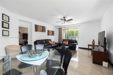 Beautifully maintained 5 bed, 2.5 bath home in the guard-gated on Weston Hills Country Club in Florida - for sale on GolfHomes.com, golf home, golf lot