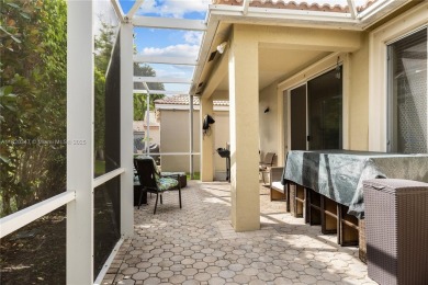 Beautifully maintained 5 bed, 2.5 bath home in the guard-gated on Weston Hills Country Club in Florida - for sale on GolfHomes.com, golf home, golf lot