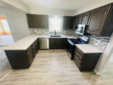 Meticulously updated ranch style house located on a quiet on Whispering Creek Golf Club in Iowa - for sale on GolfHomes.com, golf home, golf lot