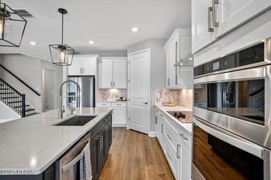 1033 Scramble Drive is a 2023 Meritage Home offering an on LPGA International Golf Course in Florida - for sale on GolfHomes.com, golf home, golf lot