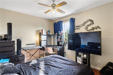 Beautifully maintained 5 bed, 2.5 bath home in the guard-gated on Weston Hills Country Club in Florida - for sale on GolfHomes.com, golf home, golf lot