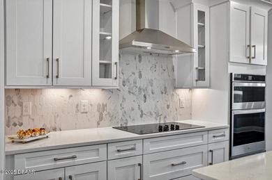 1033 Scramble Drive is a 2023 Meritage Home offering an on LPGA International Golf Course in Florida - for sale on GolfHomes.com, golf home, golf lot