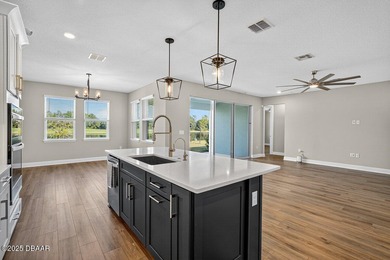 1033 Scramble Drive is a 2023 Meritage Home offering an on LPGA International Golf Course in Florida - for sale on GolfHomes.com, golf home, golf lot