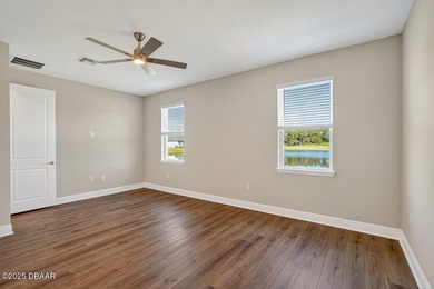 1033 Scramble Drive is a 2023 Meritage Home offering an on LPGA International Golf Course in Florida - for sale on GolfHomes.com, golf home, golf lot