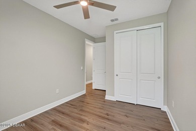 1033 Scramble Drive is a 2023 Meritage Home offering an on LPGA International Golf Course in Florida - for sale on GolfHomes.com, golf home, golf lot