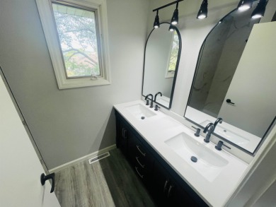 Meticulously updated ranch style house located on a quiet on Whispering Creek Golf Club in Iowa - for sale on GolfHomes.com, golf home, golf lot