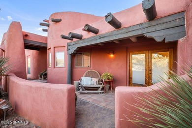 One of a kind Eddie Chavez home featuring original Pueblo style on New Mexico St Univ Golf Course in New Mexico - for sale on GolfHomes.com, golf home, golf lot