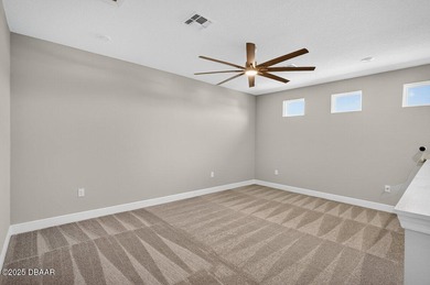 1033 Scramble Drive is a 2023 Meritage Home offering an on LPGA International Golf Course in Florida - for sale on GolfHomes.com, golf home, golf lot