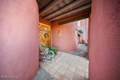 One of a kind Eddie Chavez home featuring original Pueblo style on New Mexico St Univ Golf Course in New Mexico - for sale on GolfHomes.com, golf home, golf lot