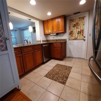 Under contract-accepting backup offers. Unfarmiliar with on Mainlands Golf Club in Florida - for sale on GolfHomes.com, golf home, golf lot
