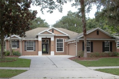 A beautiful courtyard drive welcomes you to this exquisite on North Shore Golf Club in Florida - for sale on GolfHomes.com, golf home, golf lot