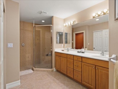 THIS BEAUTIFULLY APPOINTED THREE BEDROOM TWO BATH COACH HOME IS on Hammock Bay in Florida - for sale on GolfHomes.com, golf home, golf lot