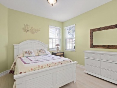 THIS BEAUTIFULLY APPOINTED THREE BEDROOM TWO BATH COACH HOME IS on Hammock Bay in Florida - for sale on GolfHomes.com, golf home, golf lot