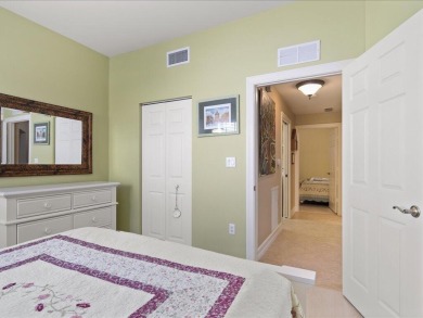 THIS BEAUTIFULLY APPOINTED THREE BEDROOM TWO BATH COACH HOME IS on Hammock Bay in Florida - for sale on GolfHomes.com, golf home, golf lot