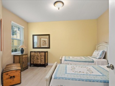 THIS BEAUTIFULLY APPOINTED THREE BEDROOM TWO BATH COACH HOME IS on Hammock Bay in Florida - for sale on GolfHomes.com, golf home, golf lot