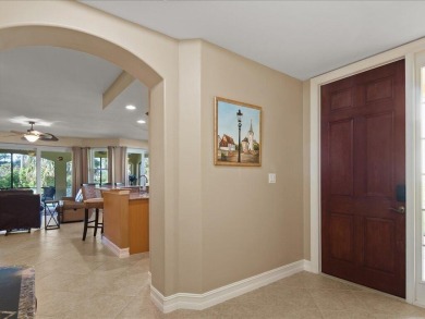 THIS BEAUTIFULLY APPOINTED THREE BEDROOM TWO BATH COACH HOME IS on Hammock Bay in Florida - for sale on GolfHomes.com, golf home, golf lot
