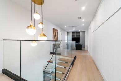 This stunning Single Family home in Aventura, FL was built in on Turnberry Isle Resort and Club in Florida - for sale on GolfHomes.com, golf home, golf lot