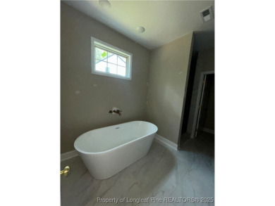 Beautiful 3 bedroom 2.5 bath Ranch home WITH finished bonus on Deercroft Golf and Country Club in North Carolina - for sale on GolfHomes.com, golf home, golf lot
