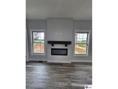 Must see to believe!  Contemporary home with an open floor plan on Lincoln Trail Country Club in Kentucky - for sale on GolfHomes.com, golf home, golf lot