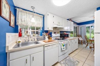 Discover the charm of this beautifully updated 2-bedroom on Country Club At Silver Springs Shores in Florida - for sale on GolfHomes.com, golf home, golf lot
