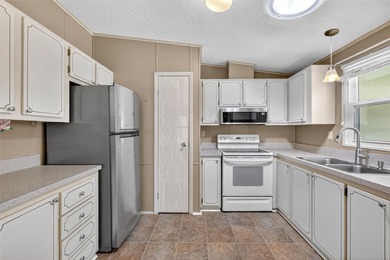 One or more photo(s) has been virtually staged. Discover the on El Diablo Executive Golf Course in Florida - for sale on GolfHomes.com, golf home, golf lot