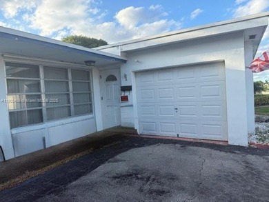 Investment Opportunity:Whether you're looking to renovate and on Sunrise Lakes Phase III in Florida - for sale on GolfHomes.com, golf home, golf lot