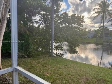 Investment Opportunity:Whether you're looking to renovate and on Sunrise Lakes Phase III in Florida - for sale on GolfHomes.com, golf home, golf lot