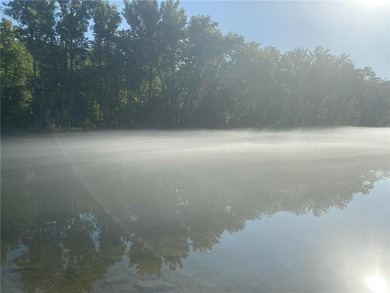 Build your Ozark dream on this beautiful 0.29-acre lot on on Holiday Island Golf Course in Arkansas - for sale on GolfHomes.com, golf home, golf lot