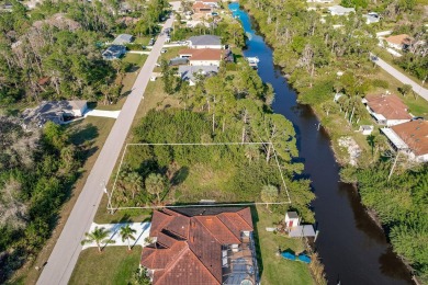 Discover the perfect canvas for your dream home! This waterfront on Sabal Trace Golf and Country Club in Florida - for sale on GolfHomes.com, golf home, golf lot