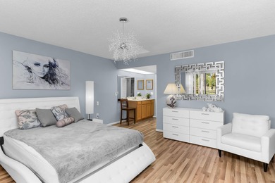 Step into comfort and convenience in this beautifully maintained on Hibiscus Golf Club in Florida - for sale on GolfHomes.com, golf home, golf lot