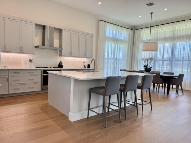 Elegant Fully Furnished Single-Level Santo Grand in Lotus Palm - on Boca Raton Municipal Golf Course in Florida - for sale on GolfHomes.com, golf home, golf lot