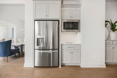 Introducing the Biscayne in Parkside Reserve. This home is on Heritage Park Golf Course in Kansas - for sale on GolfHomes.com, golf home, golf lot