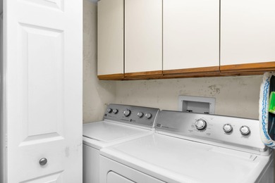 Step into comfort and convenience in this beautifully maintained on Hibiscus Golf Club in Florida - for sale on GolfHomes.com, golf home, golf lot