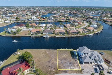 WATERFRONT LOT IN PGI W/SAILBOAT ACCESS & WIDE CANAL VIEW - This on Saint Andrews South Golf Club in Florida - for sale on GolfHomes.com, golf home, golf lot