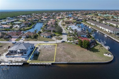 WATERFRONT LOT IN PGI W/SAILBOAT ACCESS & WIDE CANAL VIEW - This on Saint Andrews South Golf Club in Florida - for sale on GolfHomes.com, golf home, golf lot