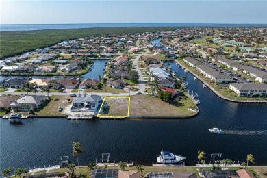 WATERFRONT LOT IN PGI W/SAILBOAT ACCESS & WIDE CANAL VIEW - This on Saint Andrews South Golf Club in Florida - for sale on GolfHomes.com, golf home, golf lot