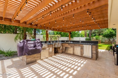 Beautifully updated turn-key home blends modern luxury with on Gainey Ranch Golf Club in Arizona - for sale on GolfHomes.com, golf home, golf lot